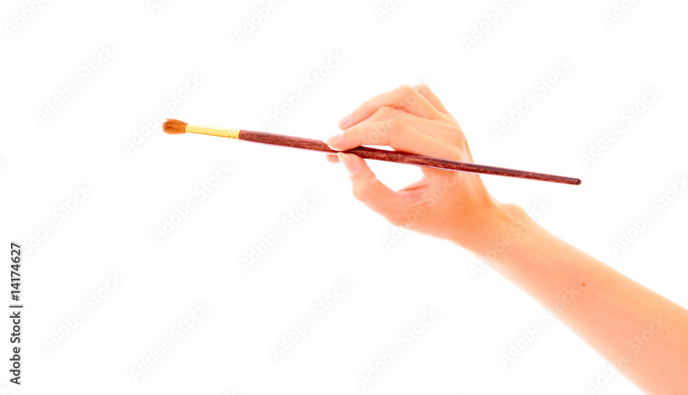 Brush in hand isolated on white Brush in hand isolated on white
