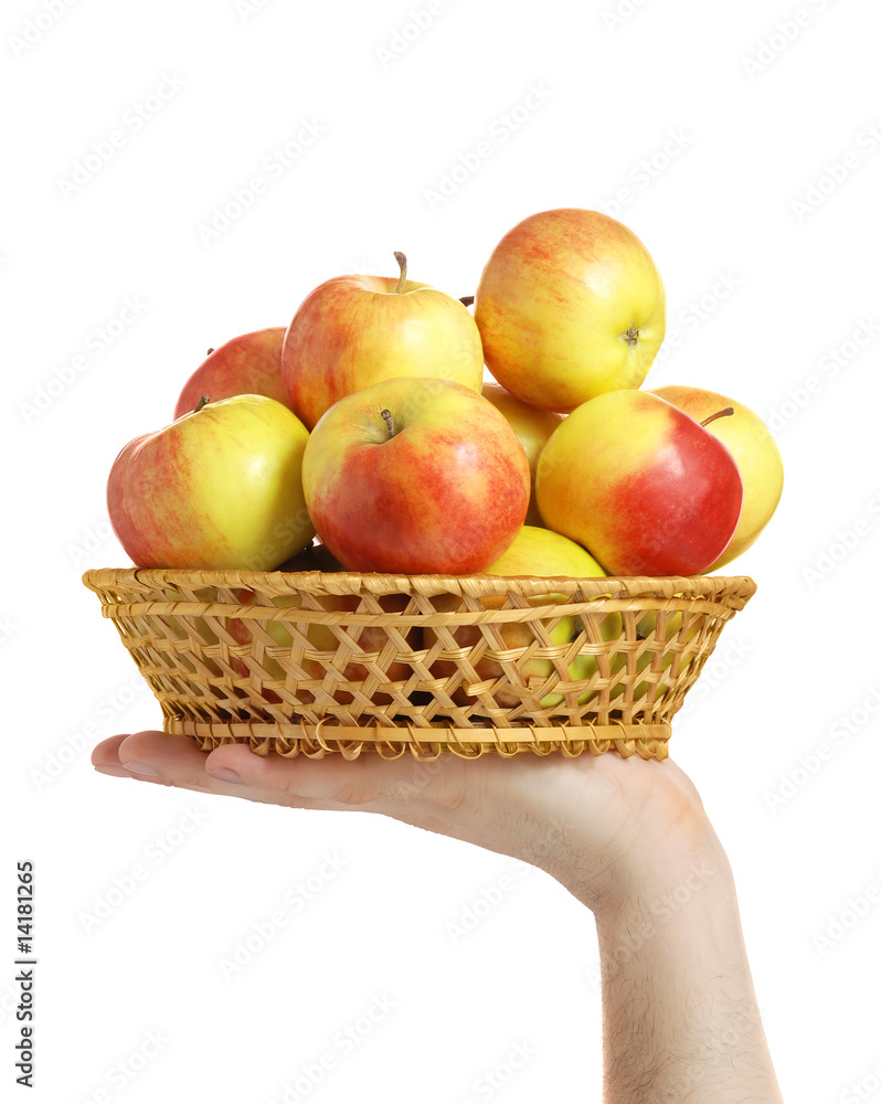 Ripe apples in a wum bowl on a hand Ripe apples in a wum bowl on a hand