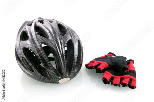 Bicycle helm with cycle gloves isolated on white background