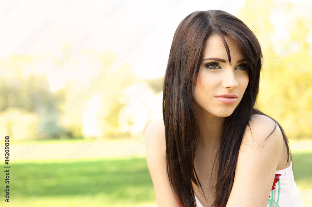 beautiful young woman on field in summer beautiful young woman on field in summer