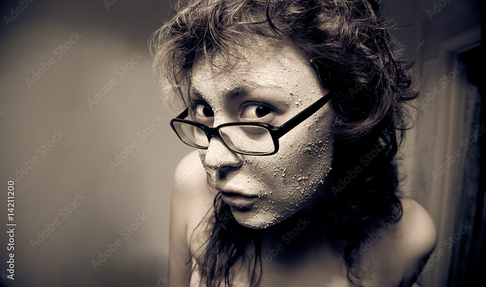 Funny girl with facial mask.