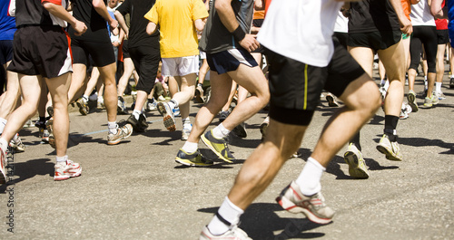 Lots of running people in a sports race © gemenacom