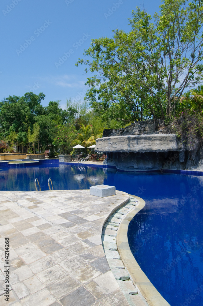 swimming pool at tropical resort
