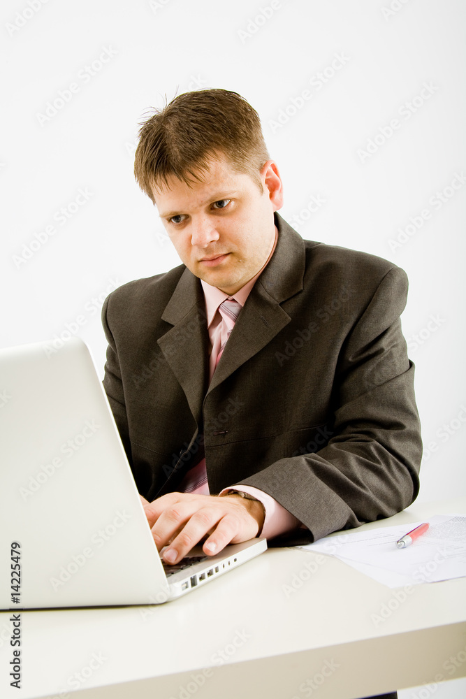 Young business man working in office Young business man working in office