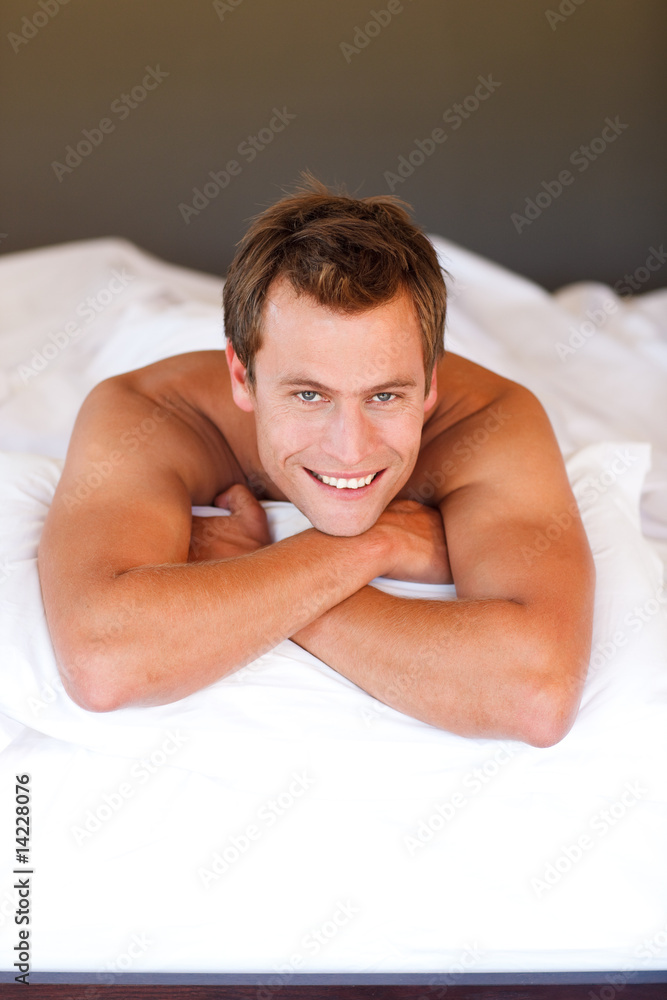 Young man relaxing in bed Young man relaxing in bed