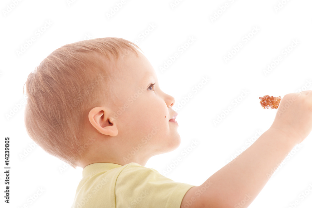 Portrait of joyful boy reach sugar candy Portrait of joyful boy reach sugar candy