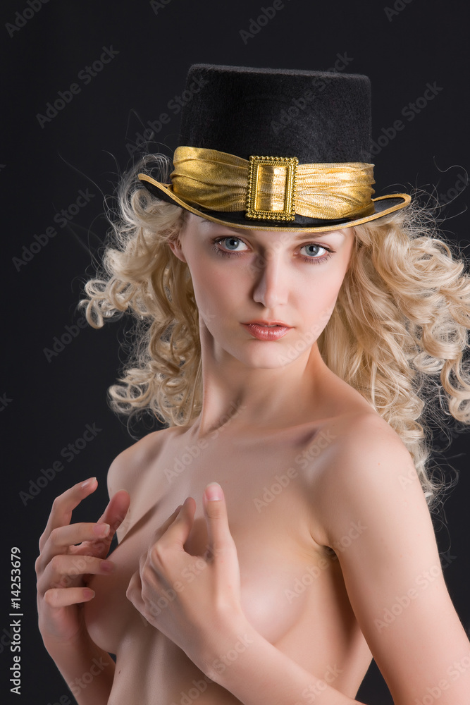 Fototapeta premium Woman In A Black Hat