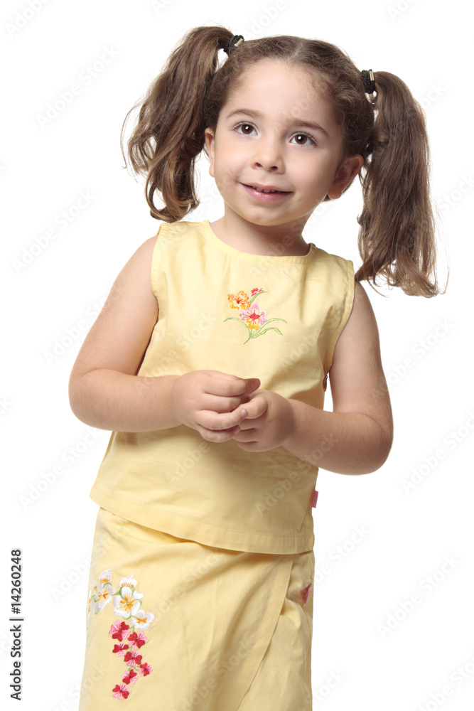 Pretty smiling little girl with ponytails Pretty smiling little girl with ponytails