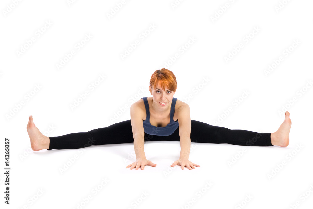 Young Woman doing Yoga Exercise