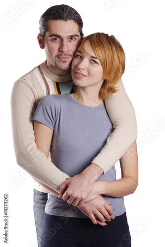 Couple in love smiling. Over white background