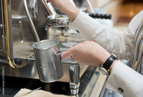 Steaming milk for preparing espresso latte