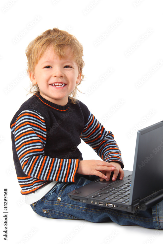Smiling boy with laptop Smiling boy with laptop