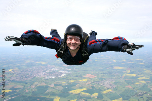 Close up of a skydiver in freefall photo
