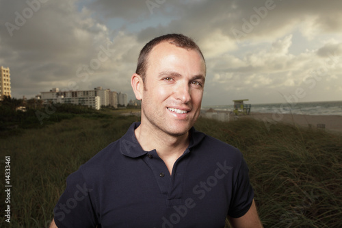 Man smiling at the beach