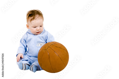 Sad toddler with basketball ball