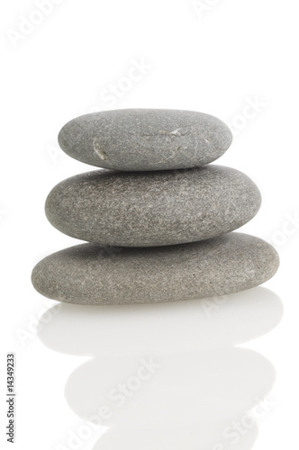 balanced rocks on white