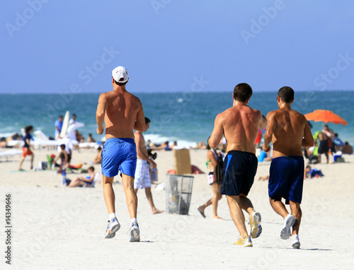 men jogging miami beach