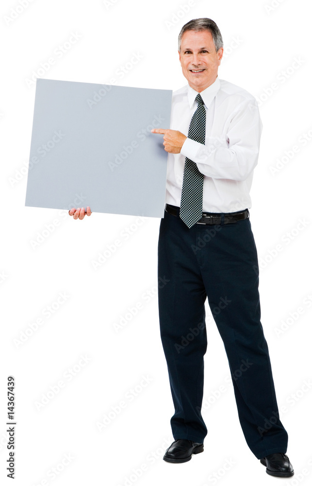 Portrait of businessman showing placard Portrait of businessman showing placard