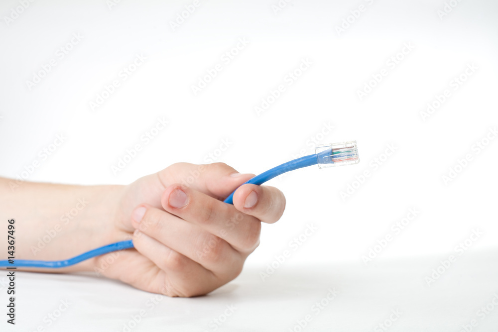 Hand holding internet cable Hand holding internet cable