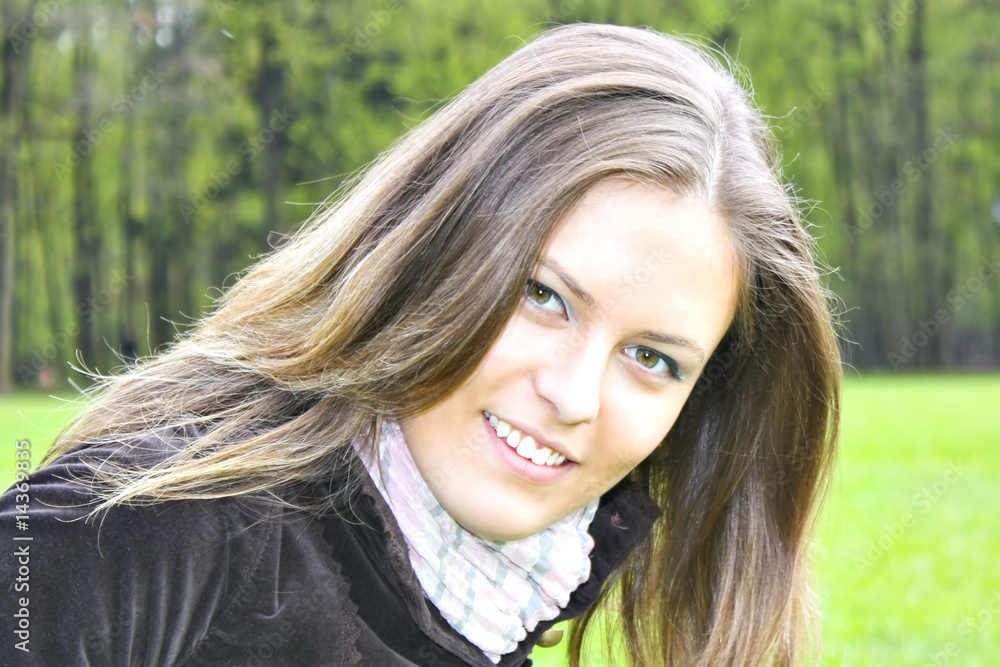 Smile teen standing on field Smile teen standing on field
