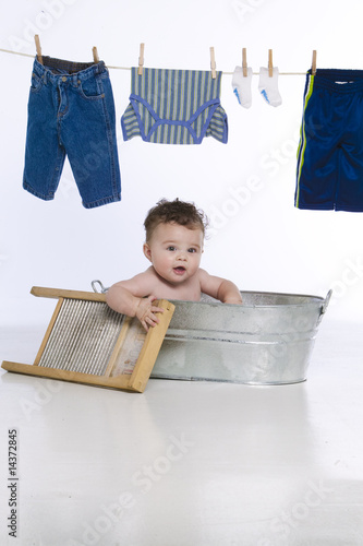 little boy in wash tub