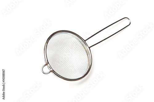 Tea strainer isolated on a white studio background.