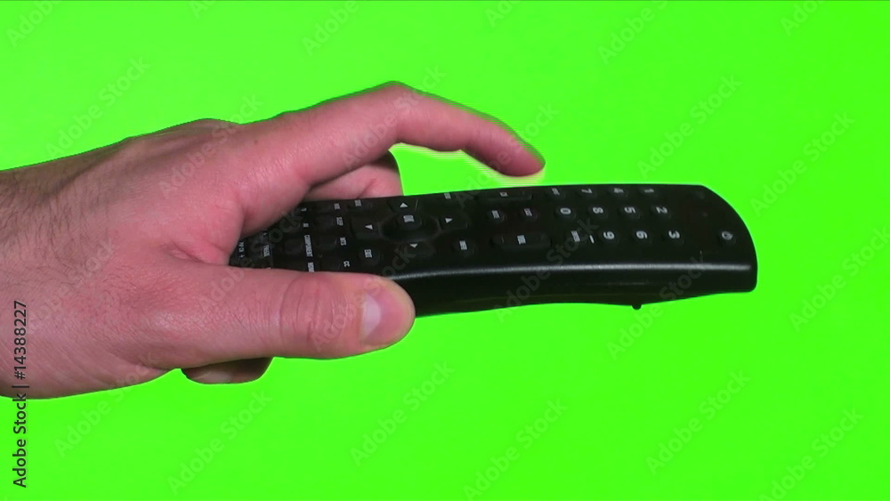 TV remote against green screen side view - HD TV remote against green screen side view - HD