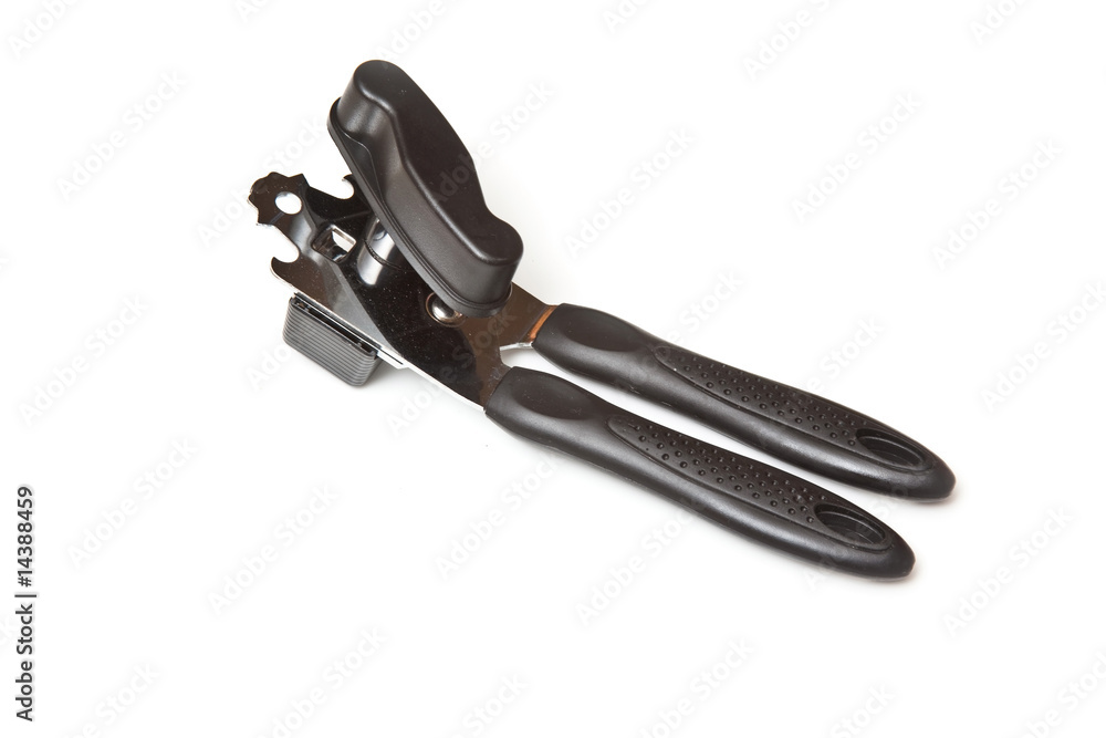 Tin opener isolated on a white studio background. Tin opener isolated on a white studio background.