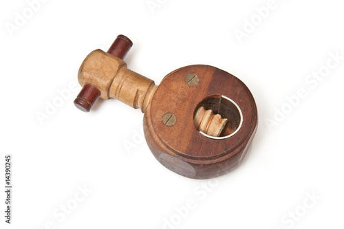 Wooden nut cracker isolated on a white studio background.