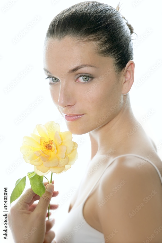 Beautiful woman portrait with yellow rose Beautiful woman portrait with yellow rose