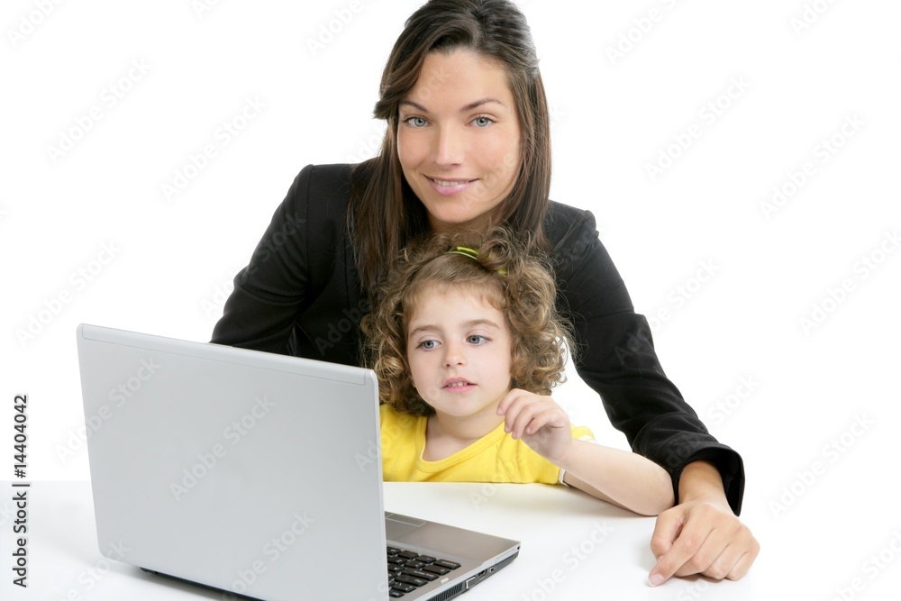 Beautiful mother and daughter laptop computer
