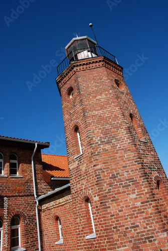 Old lighthouse by the sea and birds ringing station