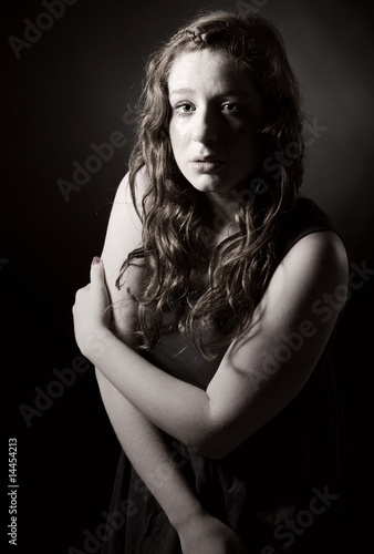 Studio Shot of an Attractive Red Headed Teenager photo