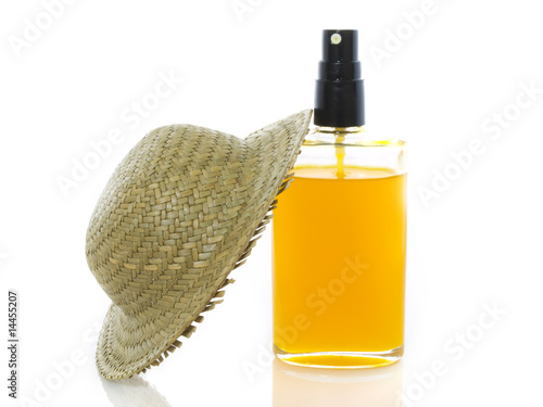 Sun oil with hat photo