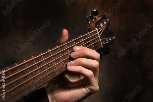 Hand with a guitar