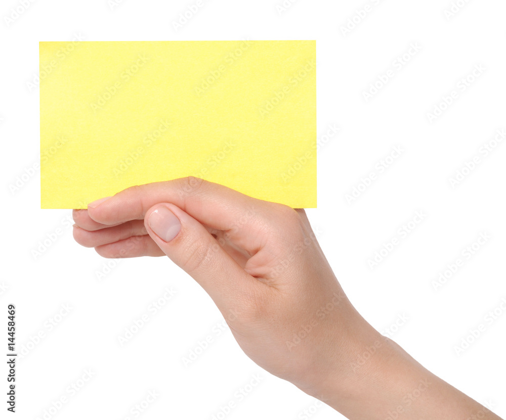 yellow card in a hand yellow card in a hand