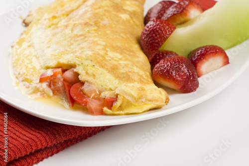 Omelet with Cheese Red Peppers and Tomatoes © Victor Martello