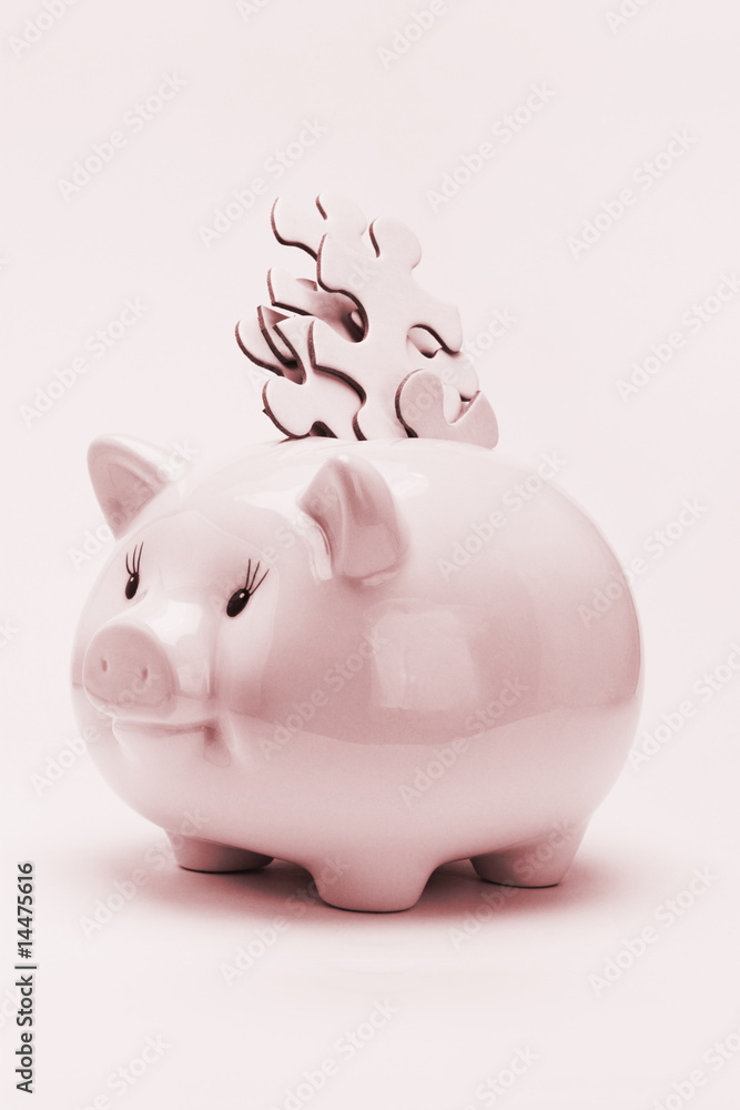 Piggy bank and jigsaw puzzles financial disarray Piggy bank and jigsaw puzzles financial disarray