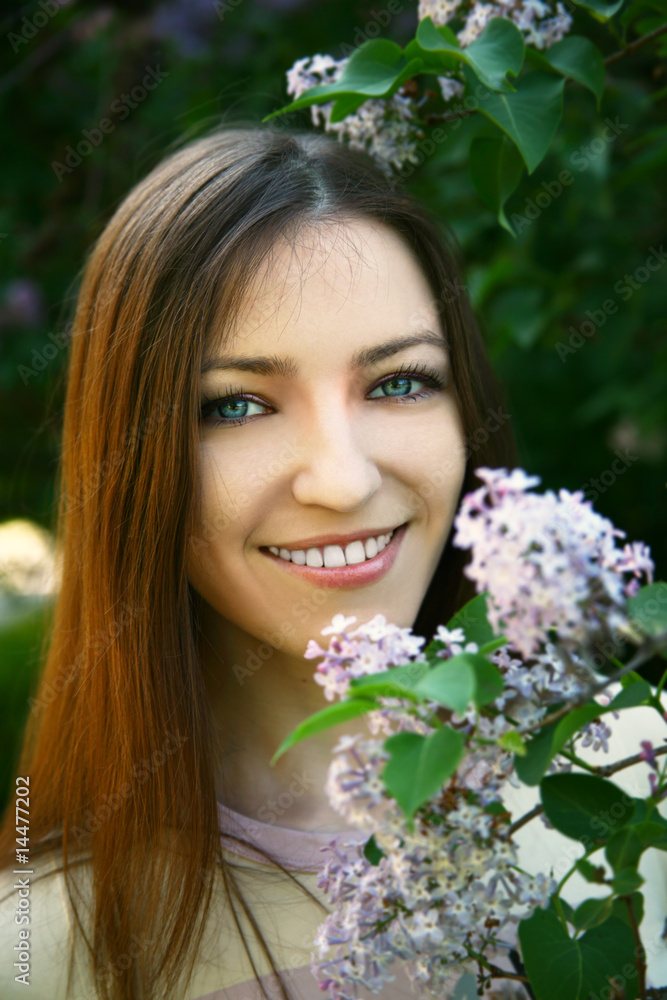 Pretty smiling girl relaxing outdoor