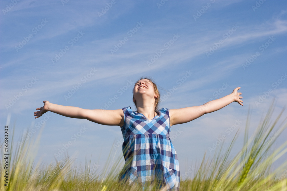Happy woman in a field Happy woman in a field