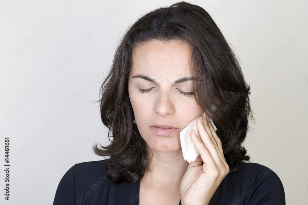 Young woman having toothache isolated on white background Young woman having toothache isolated on white background