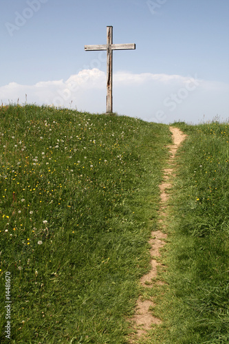 path leads to wooden cross