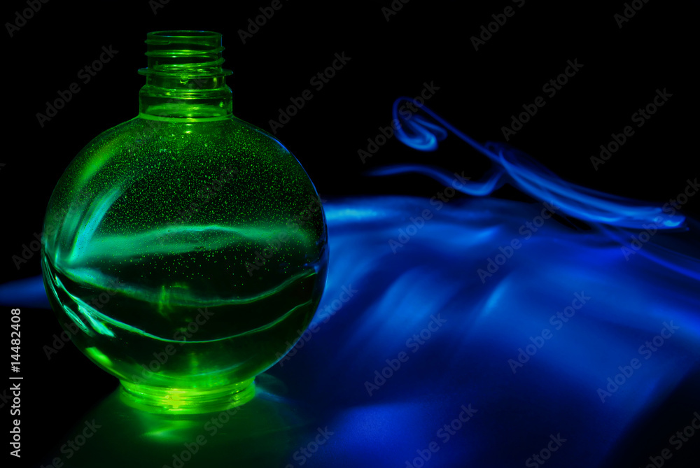 Green sphere with blue smoke
