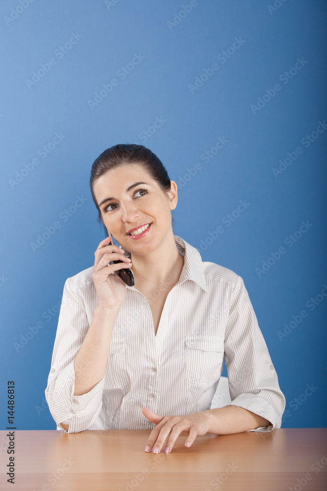 Businesswoman calling at phone Businesswoman calling at phone