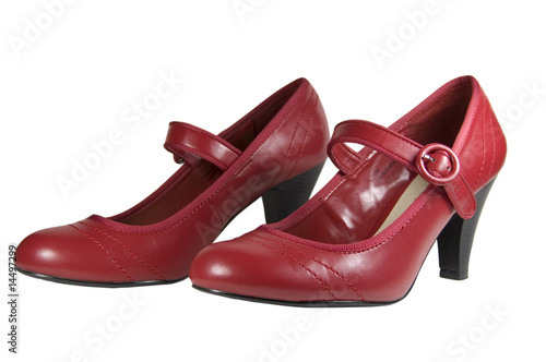 pair of red female shoes on white background