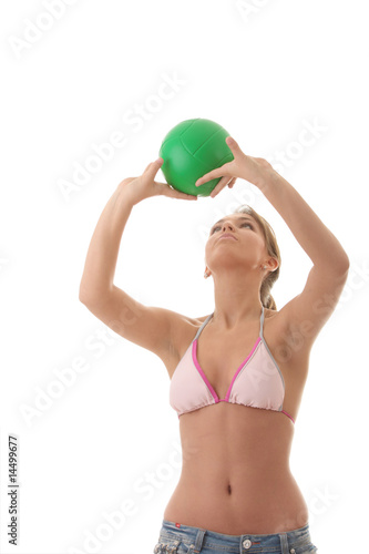 Beautiful woman playing volleyball