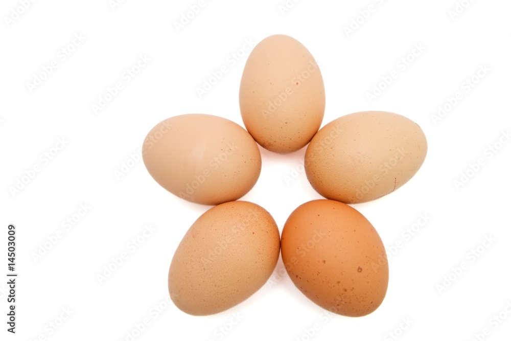 Five-pointed star of five brown eggs isolated Five-pointed star of five brown eggs isolated