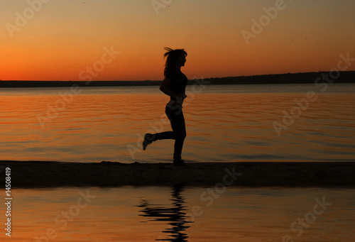 Girl running on the beach