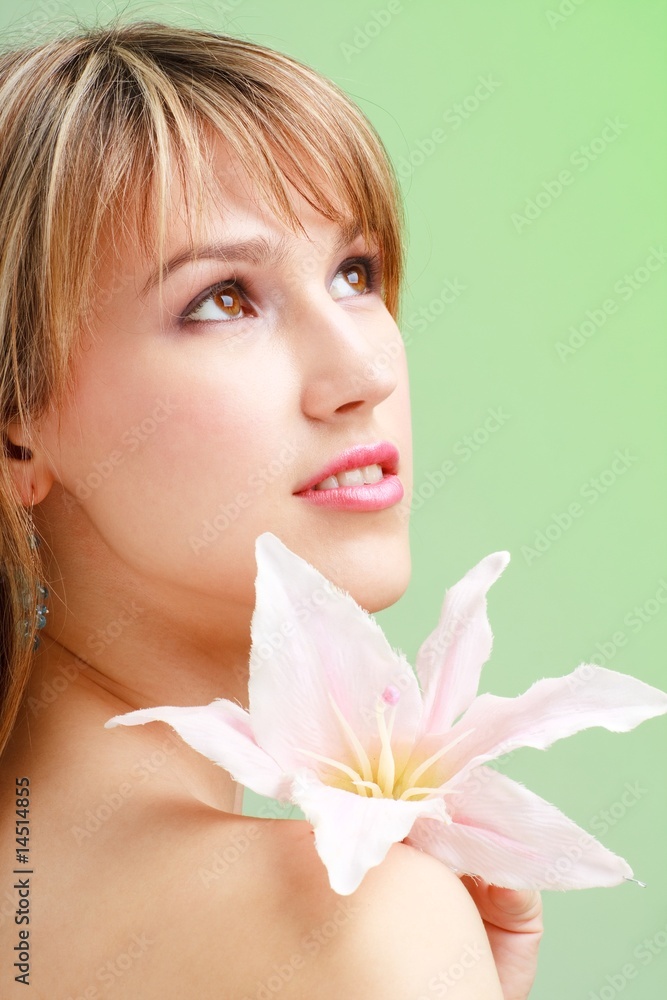 Attractive young woman with flower Attractive young woman with flower