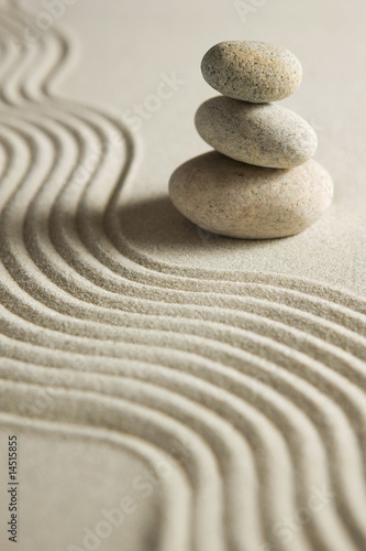 Stack of stones on raked sand